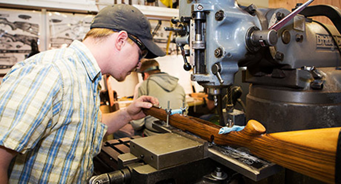 What are some accredited correspondence schools that offer gunsmithing courses?
